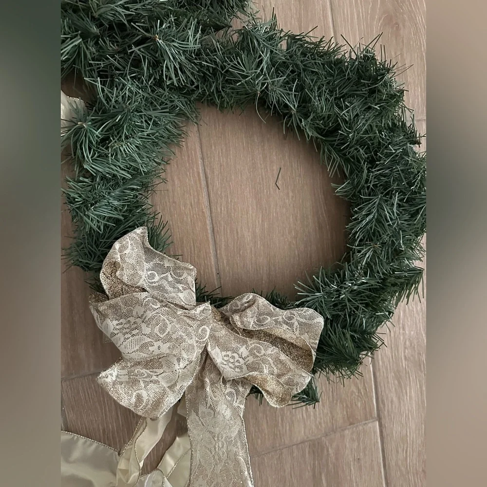 Pair of artificial Christmas wreaths with gold bows